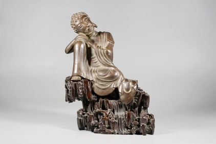 A GILT-BRONZE SEATED STATUE OF SHAKYAMUNI BUDDHA