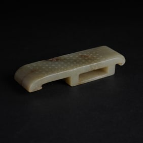 A JADE SWORD SCABBARD SLIDE (JIANZHI)