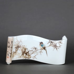 A BLACK-GROUND BIRD-AND-FLOWER-PATTERN BOOK-FORM PAPERWEIGHT
