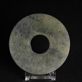 A JADE DISC (BI) WITH TADPOLE PATTERN