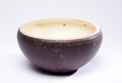 A BLACK-GLAZED BOWL