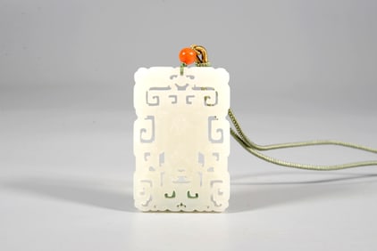 A WHITE JADE FASTING PLAQUE