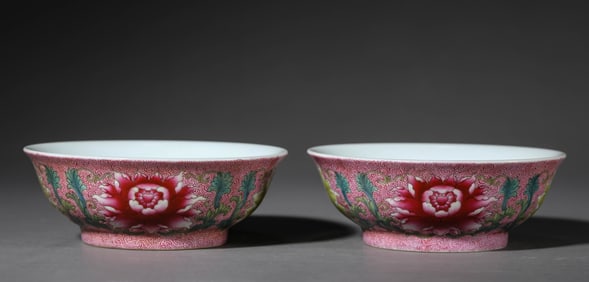 A Pair of Carmine-Ground Famille-Rose 'Floral' Bowls