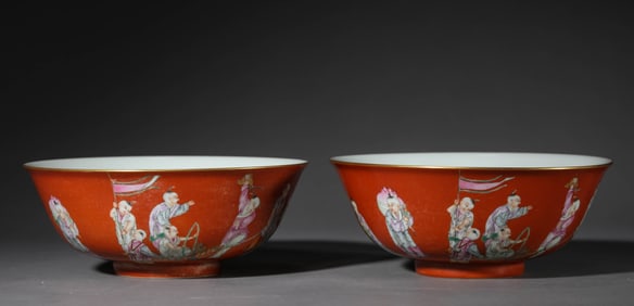 A Pair of Coral-Ground Famille-Rose 'Children at Play' Bowls