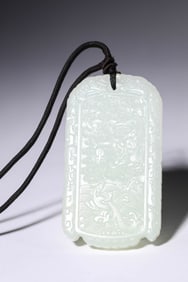 A Jade Carved 'Dragon Teaching Its Offspring' Plaque