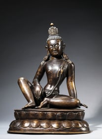 A Tibetan Guge-Style Alloy Copper Seated Guanyin Inlaid with Silver