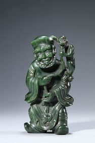 A Spinach-Jade Foreign Figure