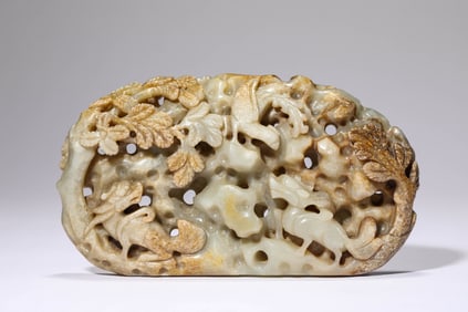 A Jade Carved 'Auspicious Beasts' Ornament