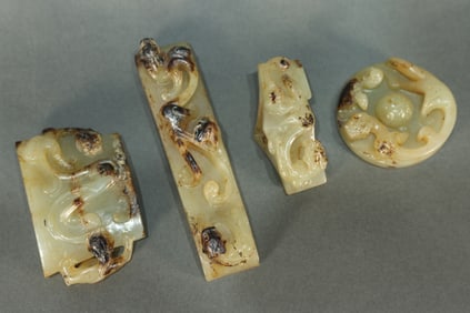 Group of Four Jade Carved Chi Dragon Pattern Sword Ornament