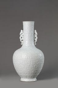 A White-Glazed 'Dragon-and-Phoenix' Vase with Chilong Handles