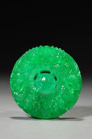 A Jadeite Plaque of 'Nine Dragons Playing Pearl'