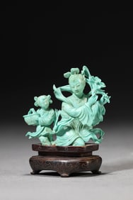 A Turquoise Carving of Figure