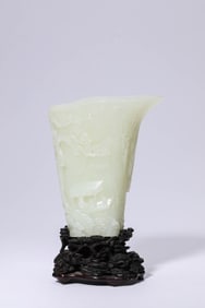 A Jade 'Scholar-Under-Pine' Rhinoceros Horn Cup