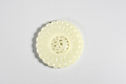 A Jade Floral and "Fu" Character Pendant
