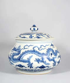 A Blue and White Cloud and Dragon Covered Jar