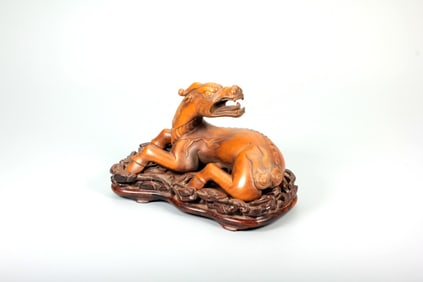 A Boxwood Auspicious Beast
