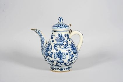 A Blue and White Interlocking Eight Treasures Ewer