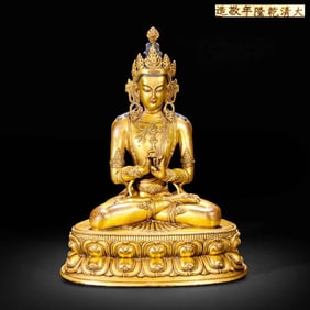 A Gilt Bronze Guanyin Statue