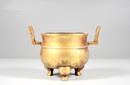 A Bronze Gilt Three-Legged Censer with Double Handles