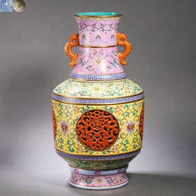 A Famille Rose Revolving Vase