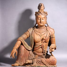 A Wooden Seated Guanyin Statue