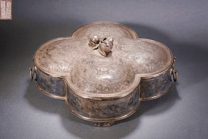 A Silver Melon and Fruit Box