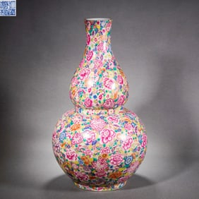 A Famille Rose "Hundred Flowers" Gourd Vase