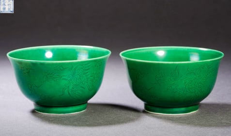 A Pair of Green Glazed Incised Dragon and Phoenix Bowls