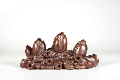 A Rosewood Magnolia Brush Rest