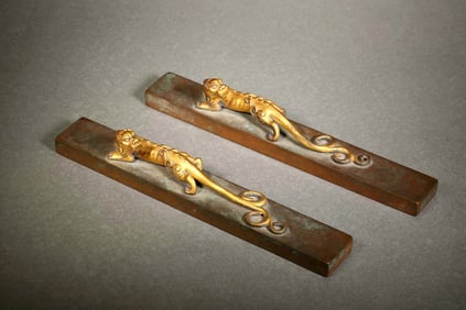 A Pair of Paperweights