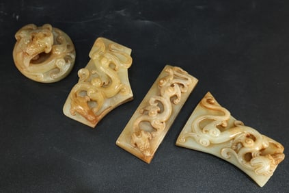 Group of Four Jade Carved Chi Dragon Sword Ornament