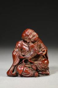 A Boxwood Carving of 'Arhat Playing with Lion'