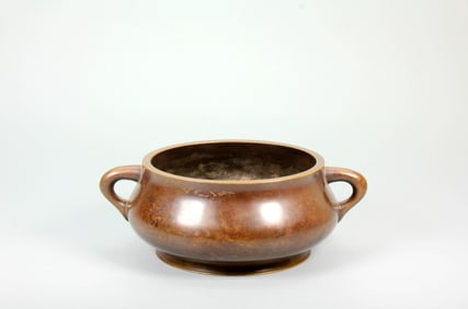 A BRONZE CENSER WITH "YOU" HANDLES