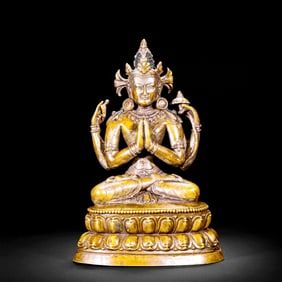 AN ALLOY BRONZE STATUE OF FOUR-ARMED GUANYIN
