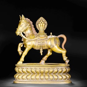 AN ALLOY BRONZE BUDDHIST ORNAMENT