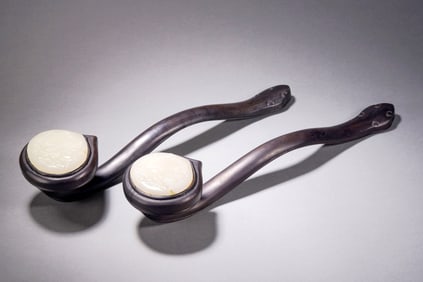 A PAIR OF HETIAN JADE RUYI SCEPTRES