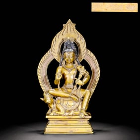 AN ALLOY BRONZE STATUE OF GUANYIN