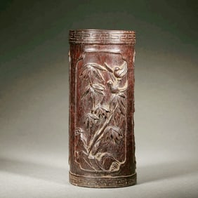 A ZITAN BRUSH POT WITH PLUM-BAMBOO RELIEF