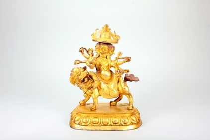 A GILT-BRONZE STATUE OF PEHAR