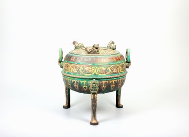 A BRONZE DING WITH GOLD-SILVER INLAY AND TURQUOISE HUMAN-BEAST MOTIFA