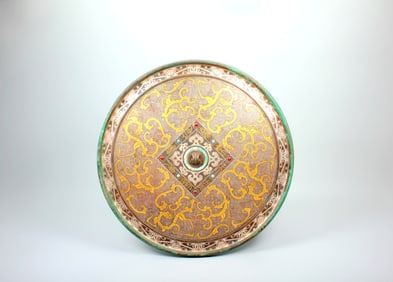 A BRONZE MIRROR WITH GOLD-SILVER INLAY AND DRAGON PATTERN