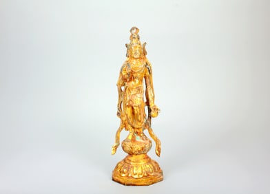 A GILT-BRONZE STATUE OF GUANYIN