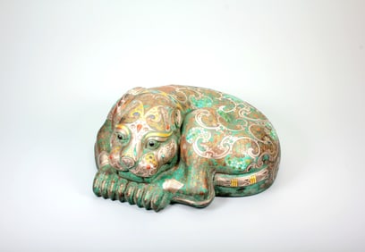 A BRONZE BEAST-SHAPED PAPERWEIGHT WITH GOLD-SILVER INLAY AND GEMS