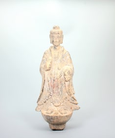 A COLORED STONE STANDING BUDDHA STATUE