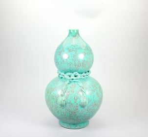A RUJUN GLAZED GOURD-SHAPED VASE WITH RIBBON DESIGN