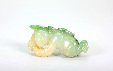 A JADEITE STATUE OF LOTUS-HOLDING BOY