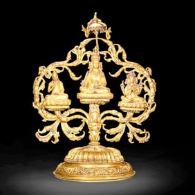 A GILT-BRONZE STATUE OF PADMASAMBHAVA