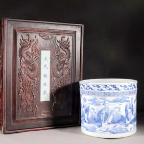 A BLUE-AND-WHITE BRUSH POT WITH FIGURAL SCENES