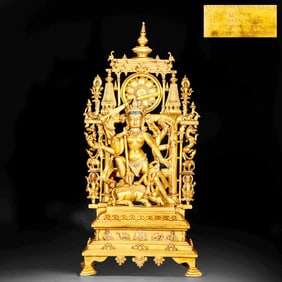 A GILT-BRONZE STATUE OF GUANYIN