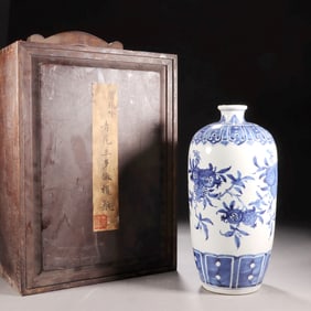 A BLUE-AND-WHITE OLIVE-SHAPED VASE WITH "THREE ABUNDANCES" MOTIF